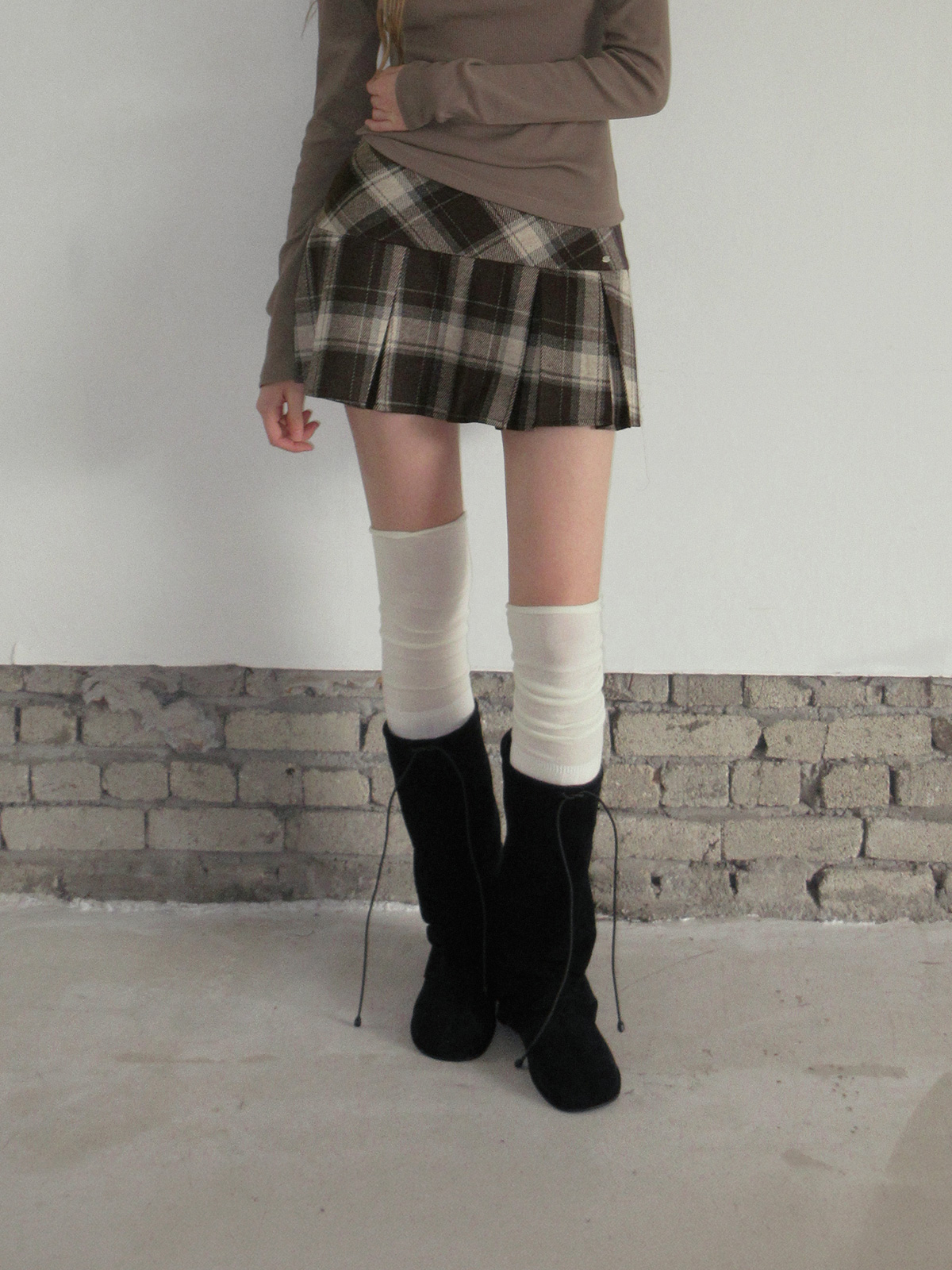 TWEE Rezon check pleated mini skirt - Model styling view