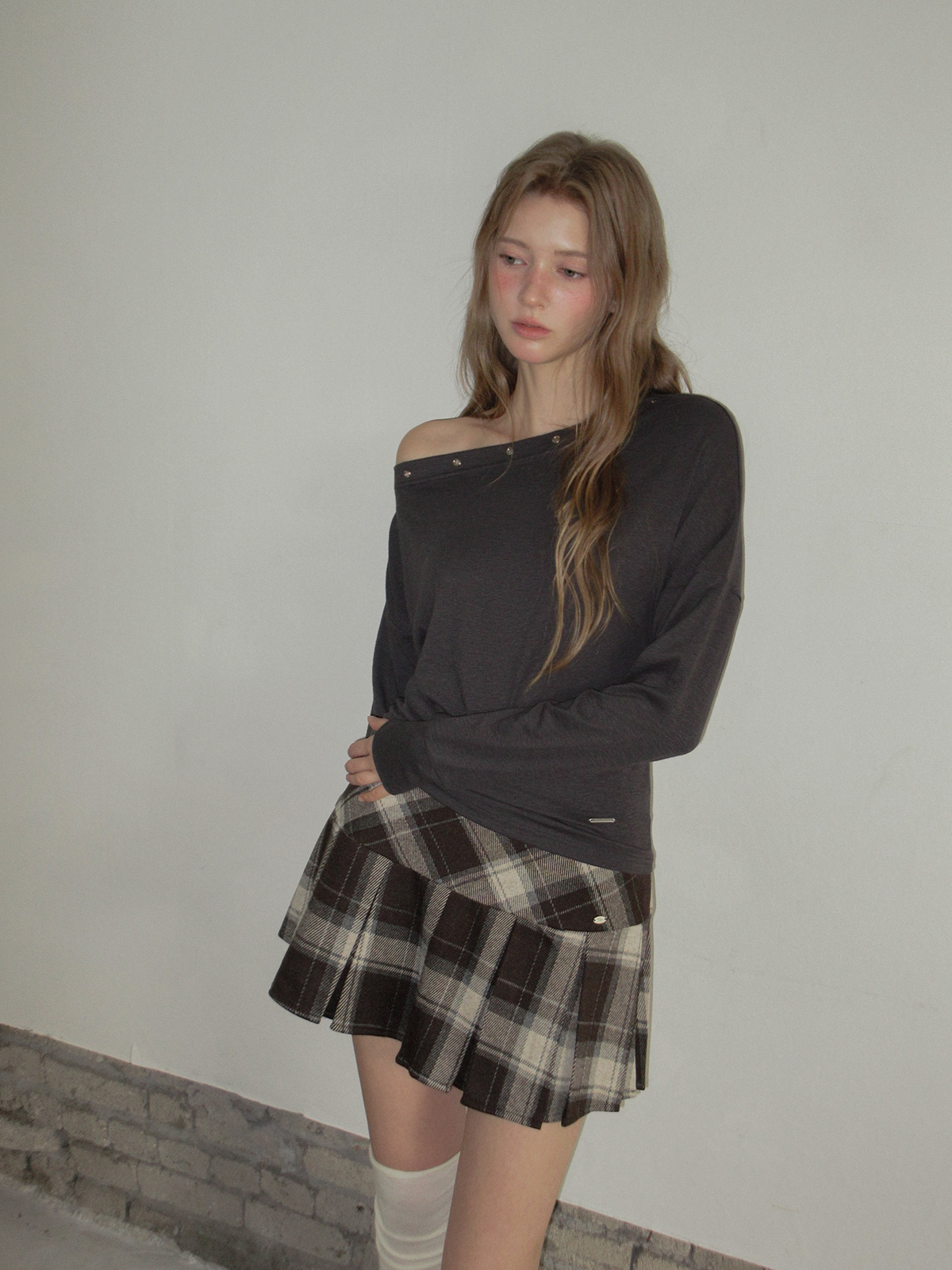 TWEE Rezon check pleated mini skirt - Model styling view