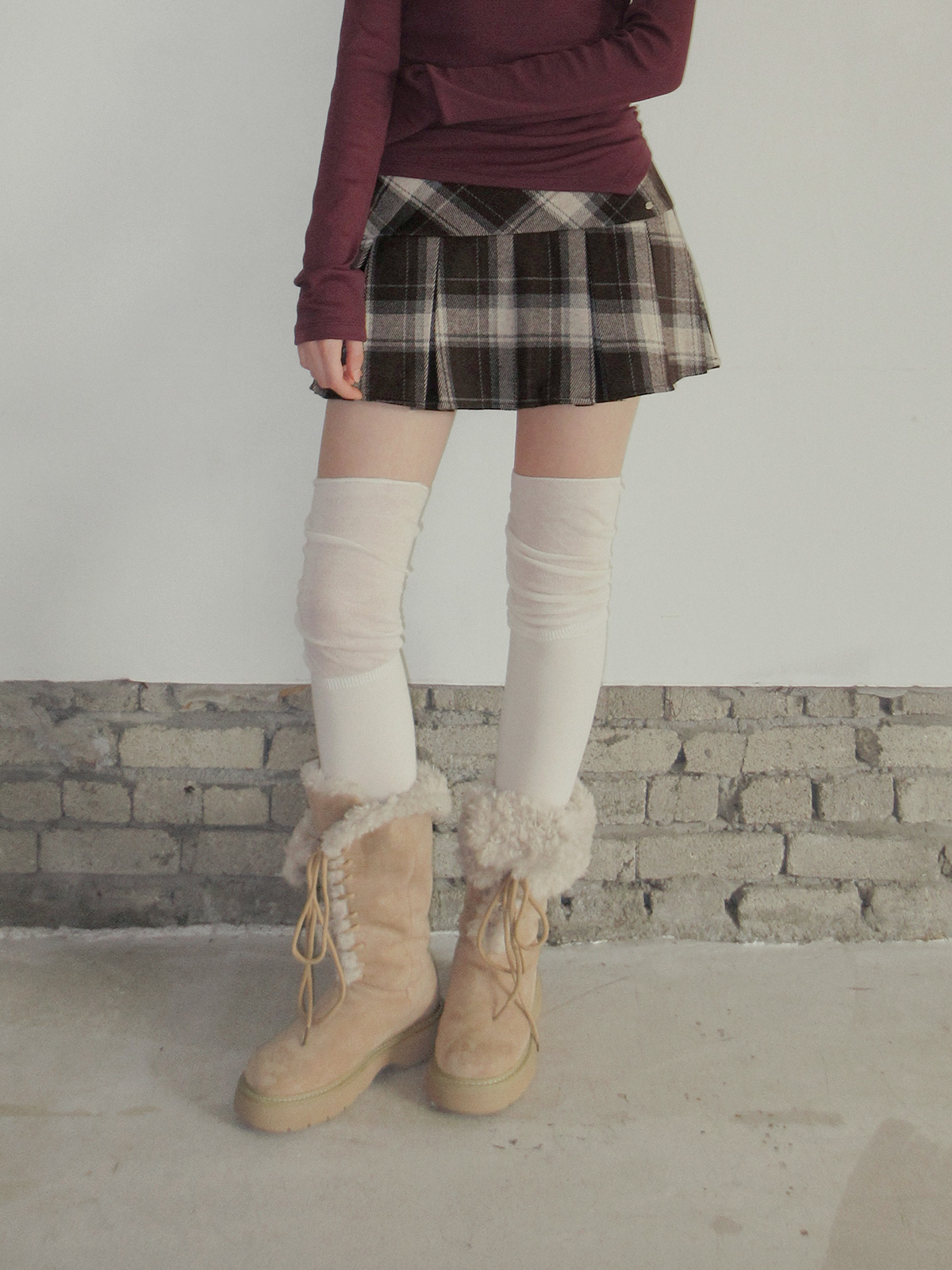 TWEE Rezon check pleated mini skirt - Model styling view
