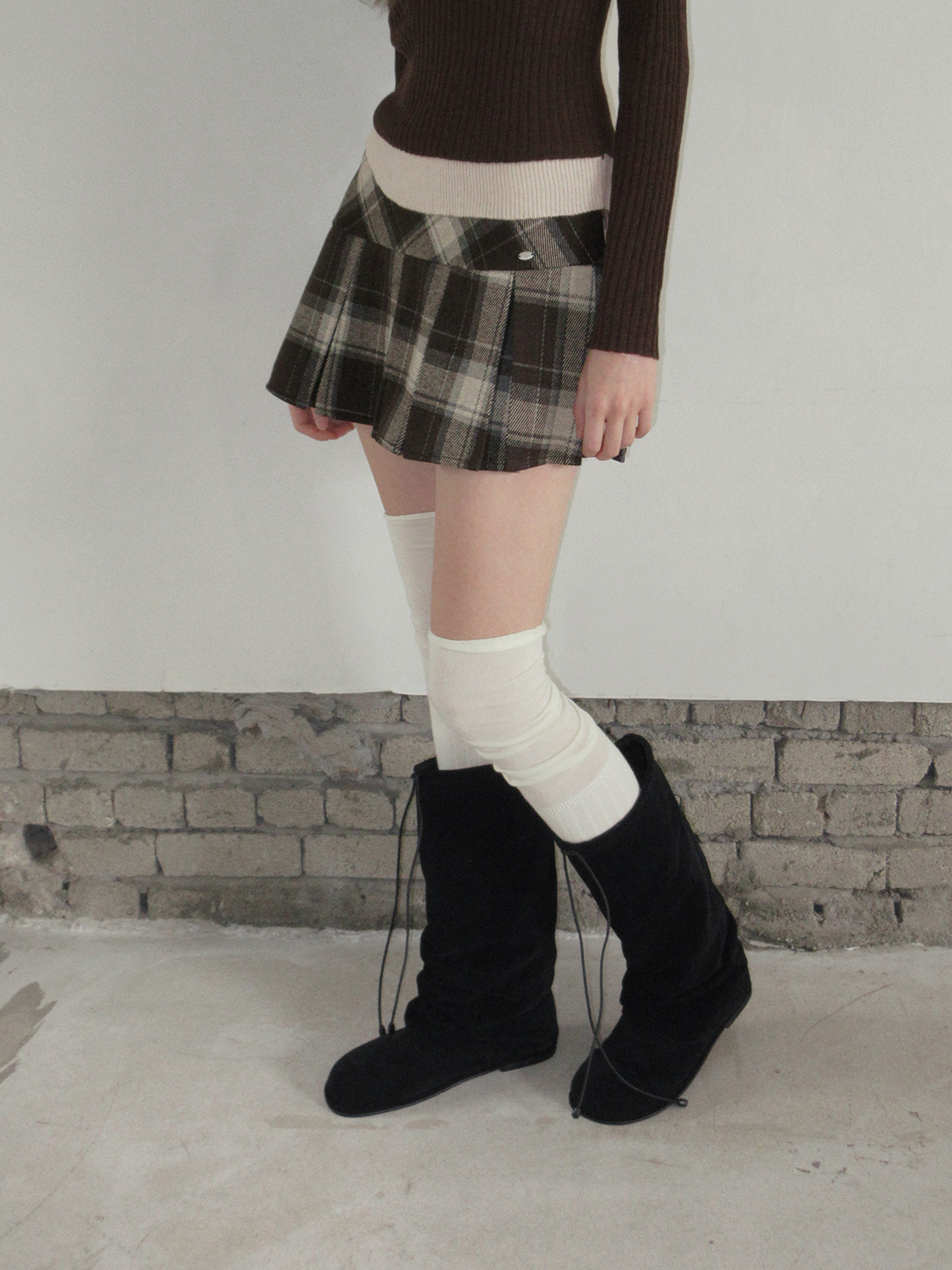 TWEE Rezon check pleated mini skirt - Model styling view