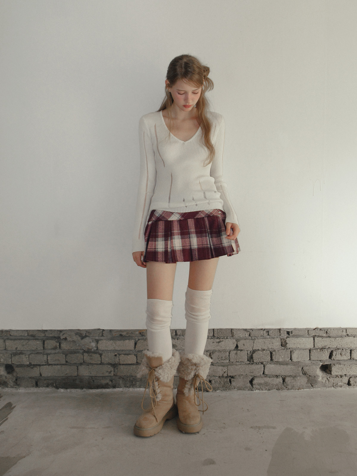 TWEE Rezon check pleated mini skirt - Model styling view