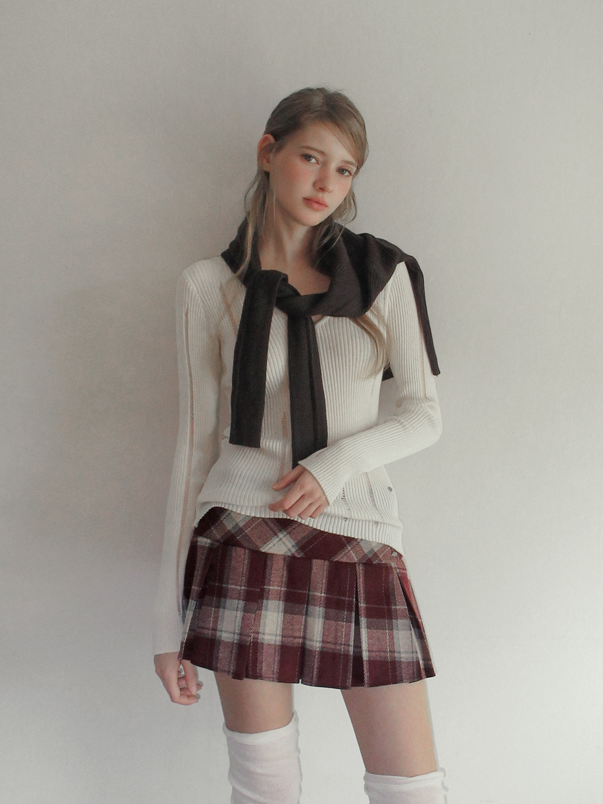 TWEE Rezon check pleated mini skirt - Model styling view