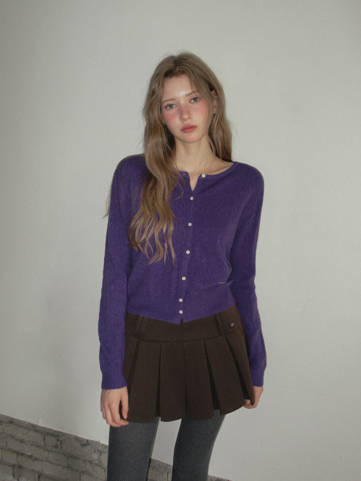 TWEE Itso cable round neck knit long sleeve cardigan - Model styling view