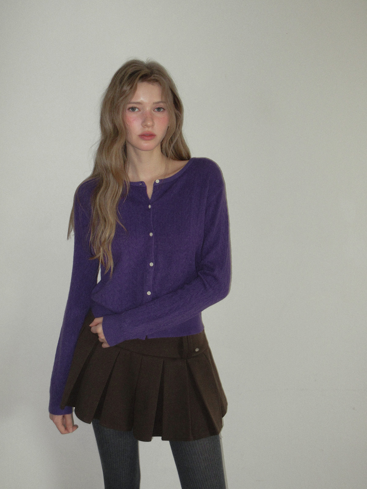 TWEE Itso cable round neck knit long sleeve cardigan - Model styling view
