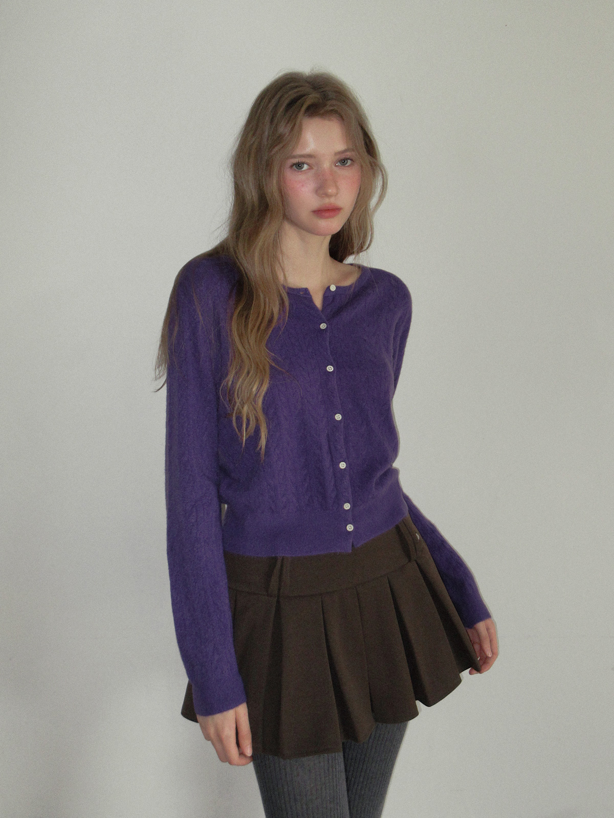 TWEE Itso cable round neck knit long sleeve cardigan - Model styling view