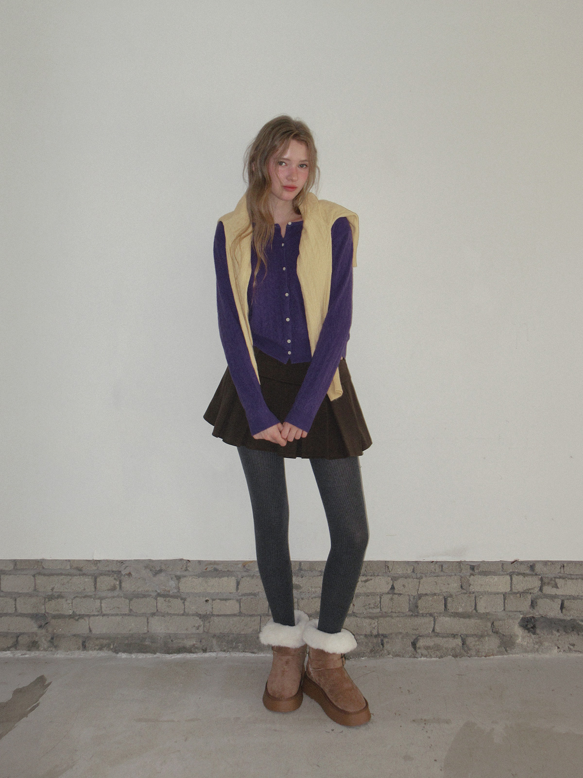 TWEE Itso cable round neck knit long sleeve cardigan - Model styling view