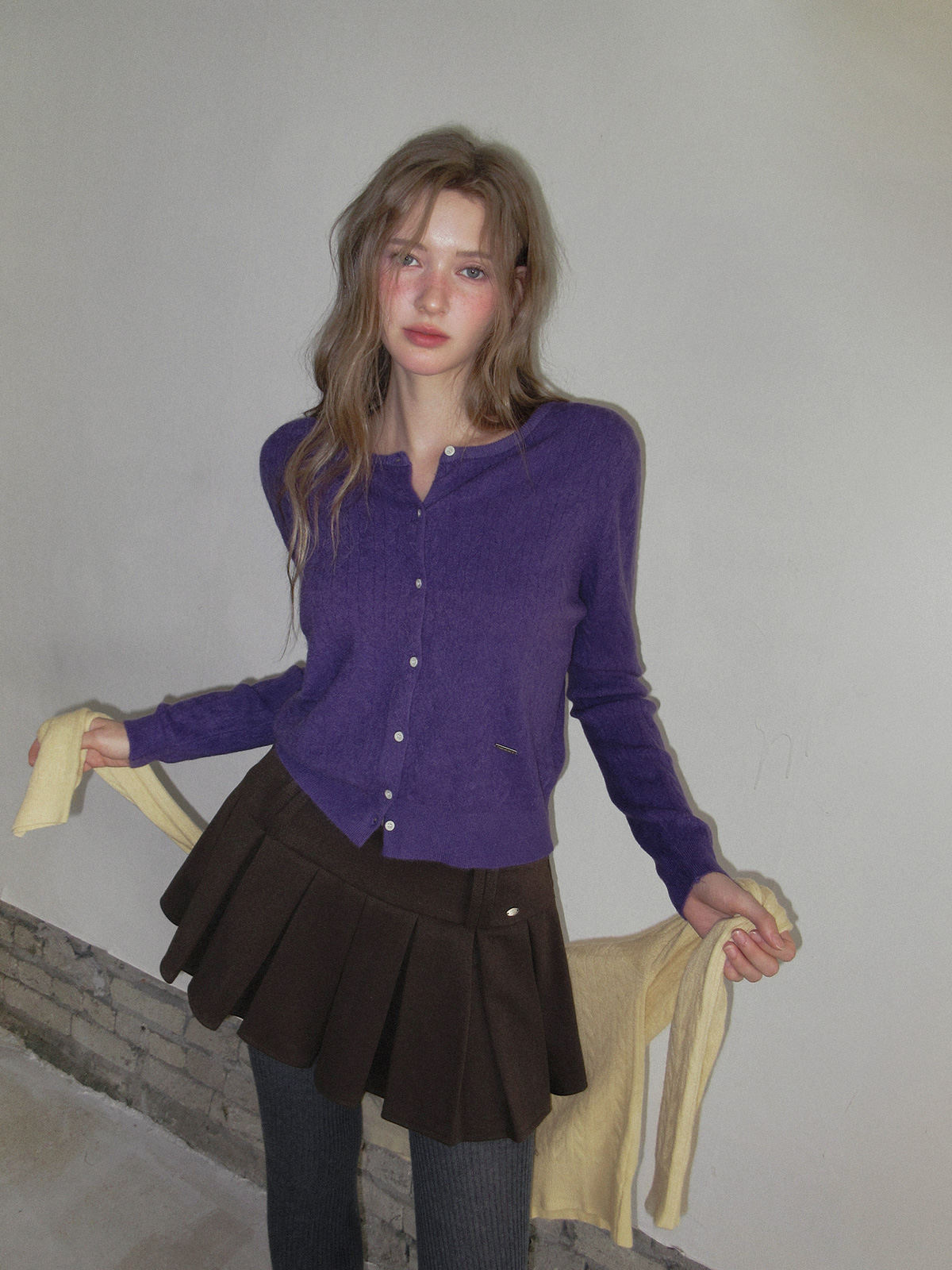 TWEE Itso cable round neck knit long sleeve cardigan - Model styling view