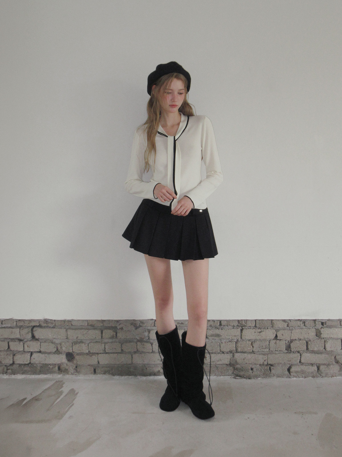 TWEE Hesi suede pleated mini skirt - Model styling view