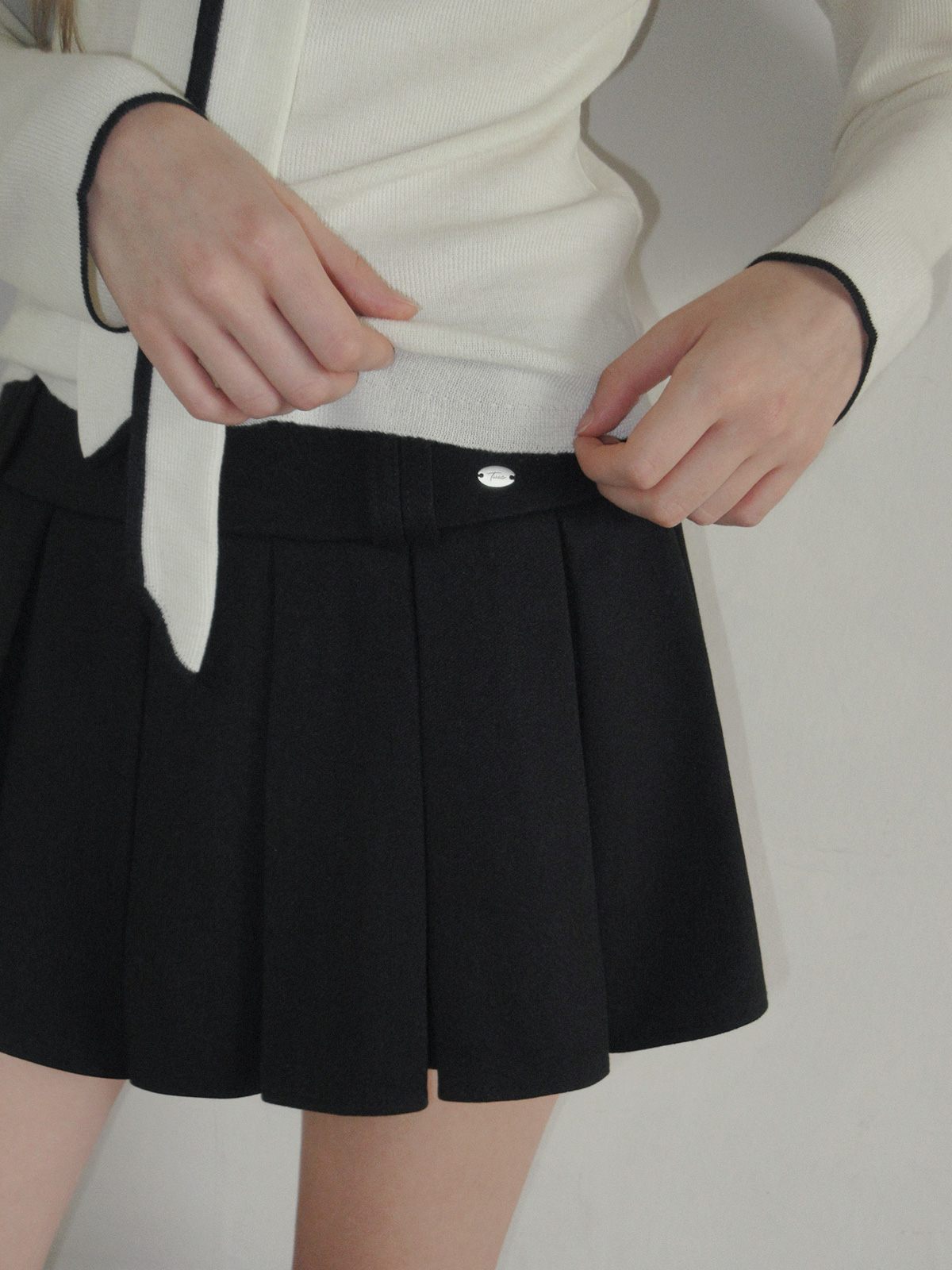 TWEE Hesi suede pleated mini skirt - Model styling view