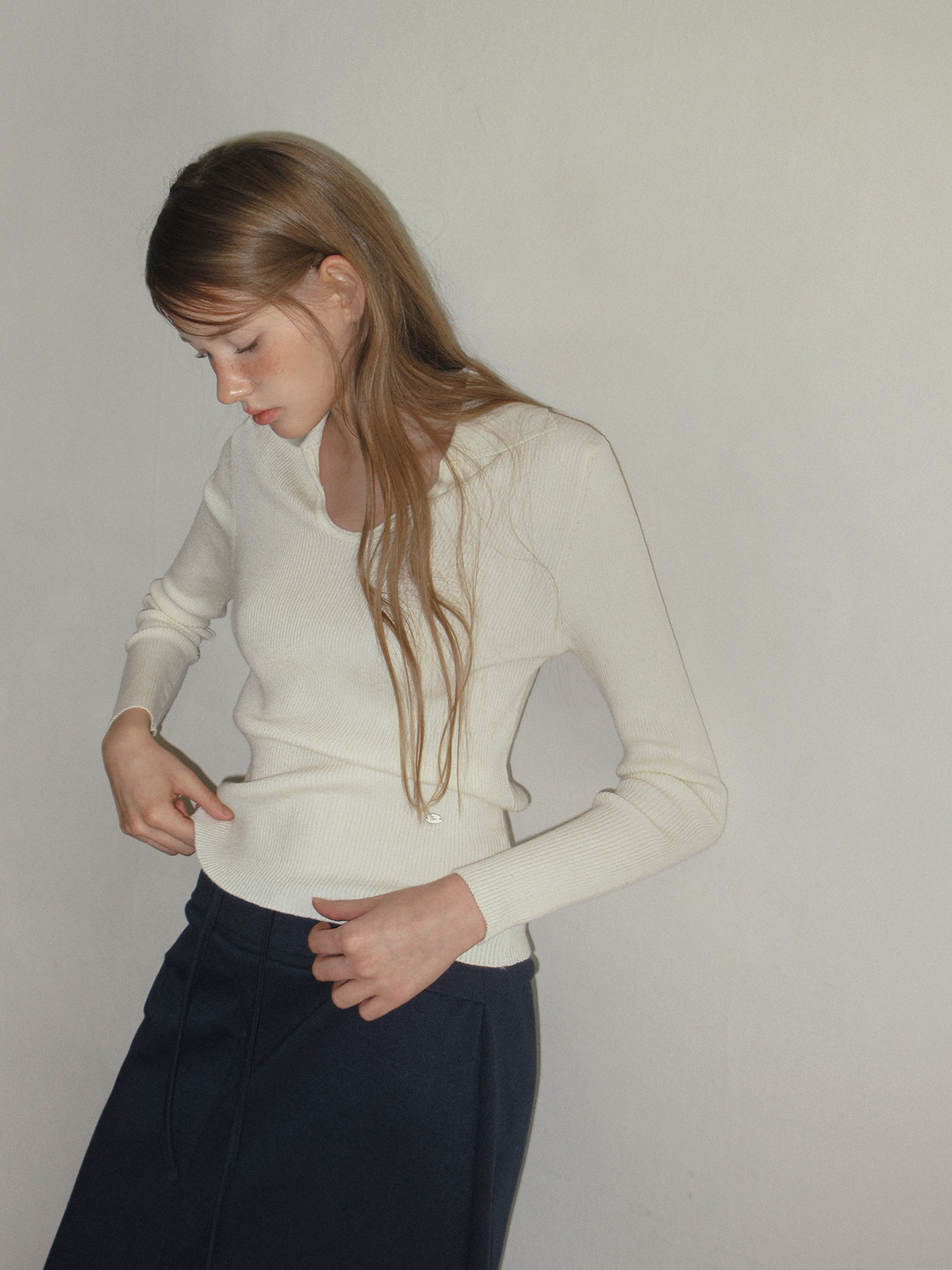 TWEE Ejeun open collar U-neck long sleeve knit - Model styling view