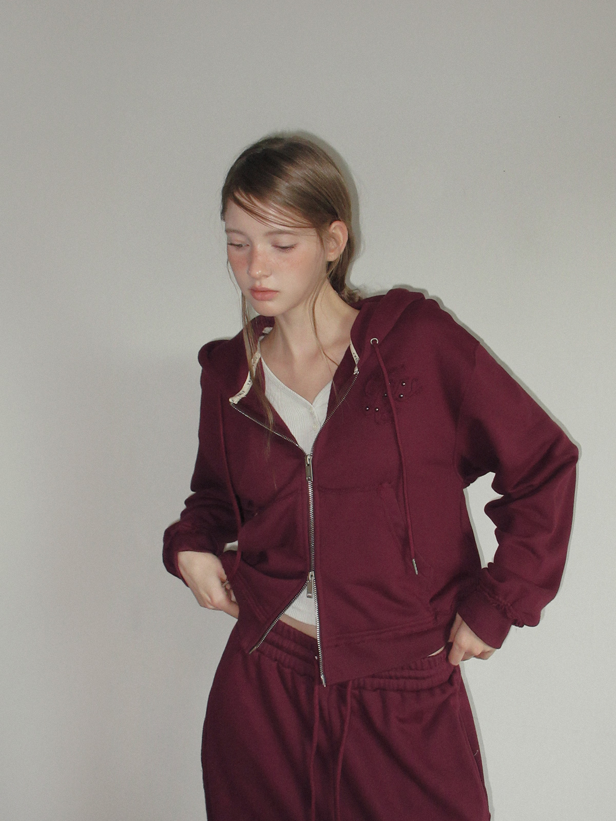 TWEE Revet stud hood zip-up - Model styling view