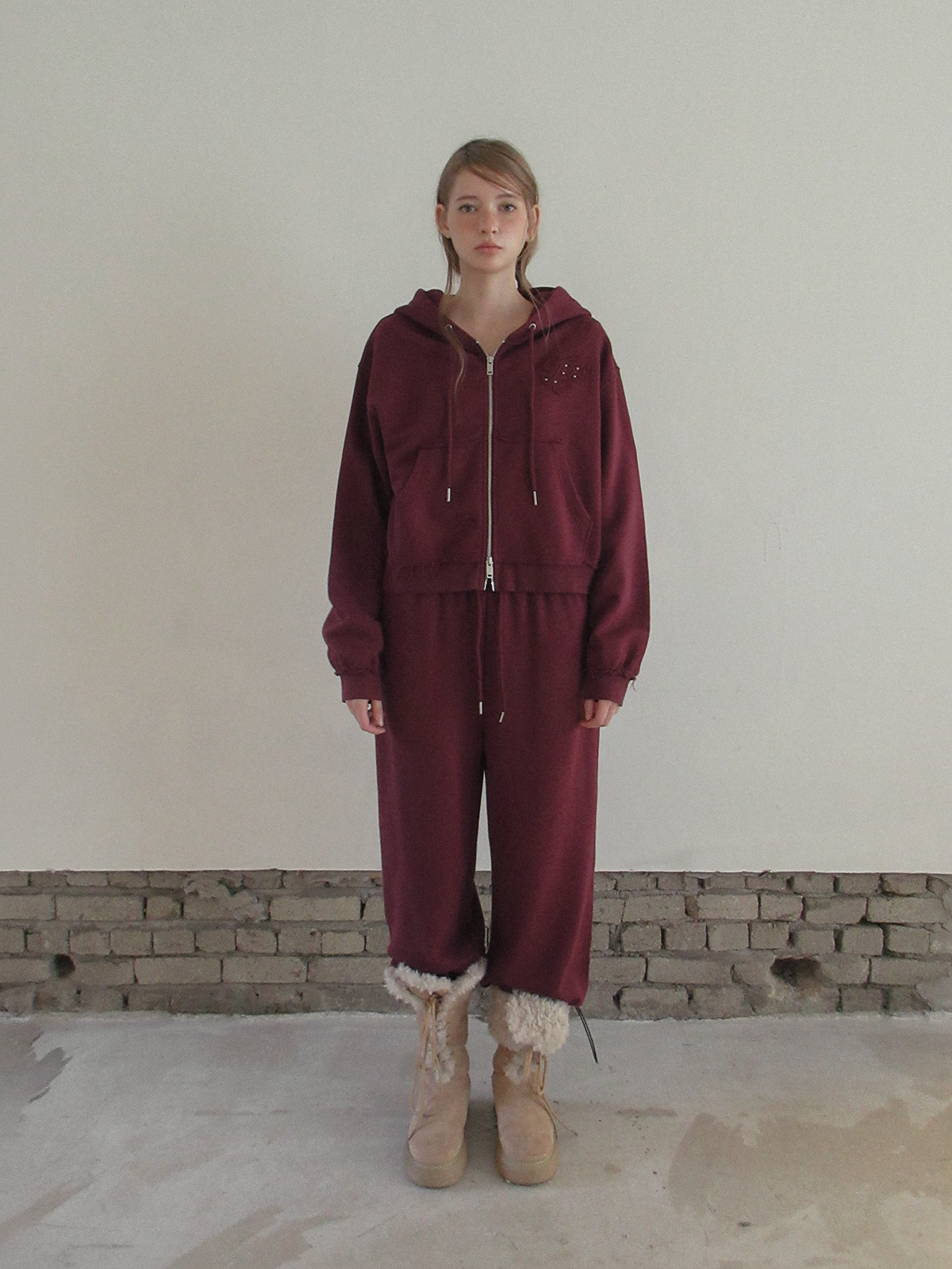 TWEE Revet stud hood zip-up - Model styling view