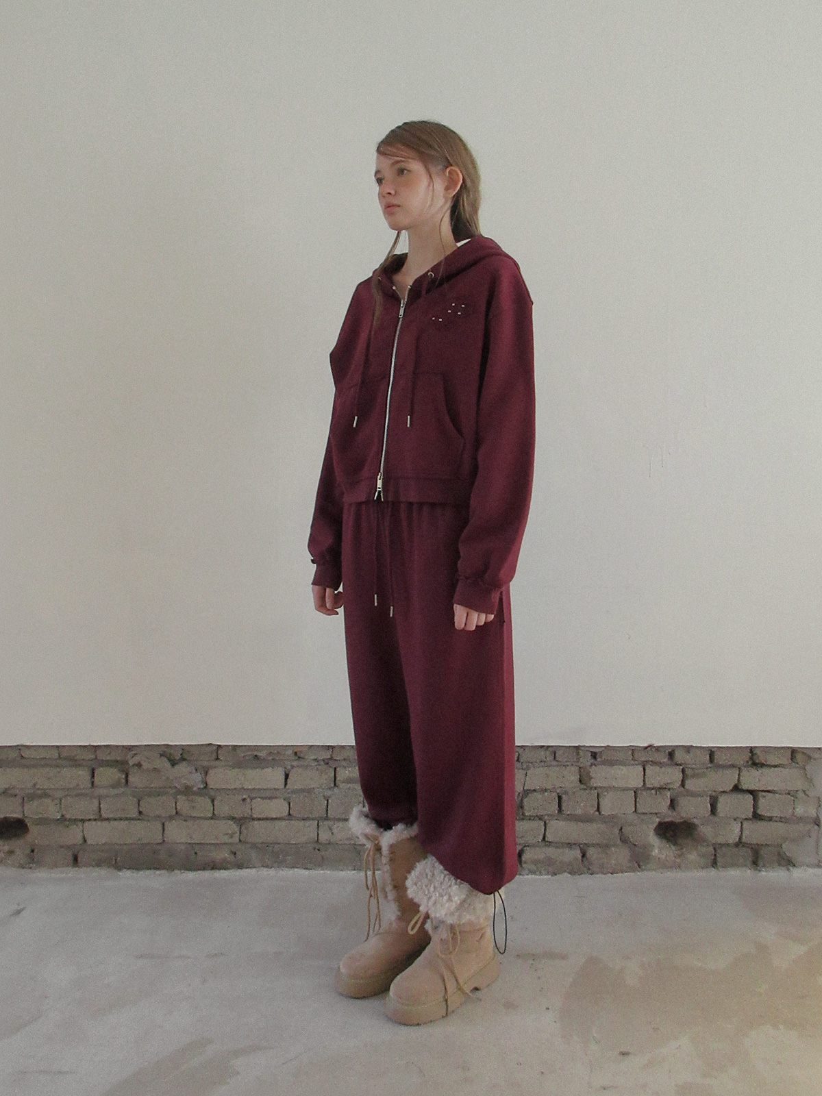 TWEE Revet stud hood zip-up - Model styling view