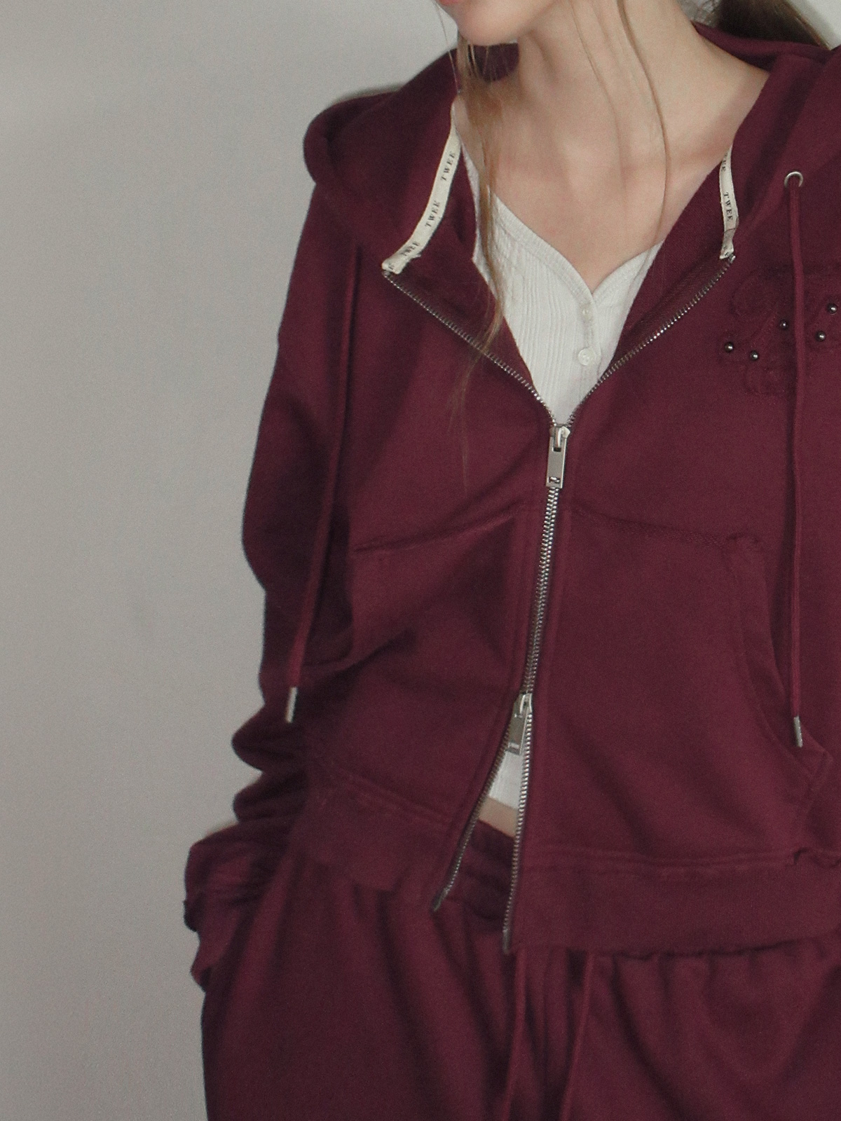 TWEE Revet stud hood zip-up - Model styling view