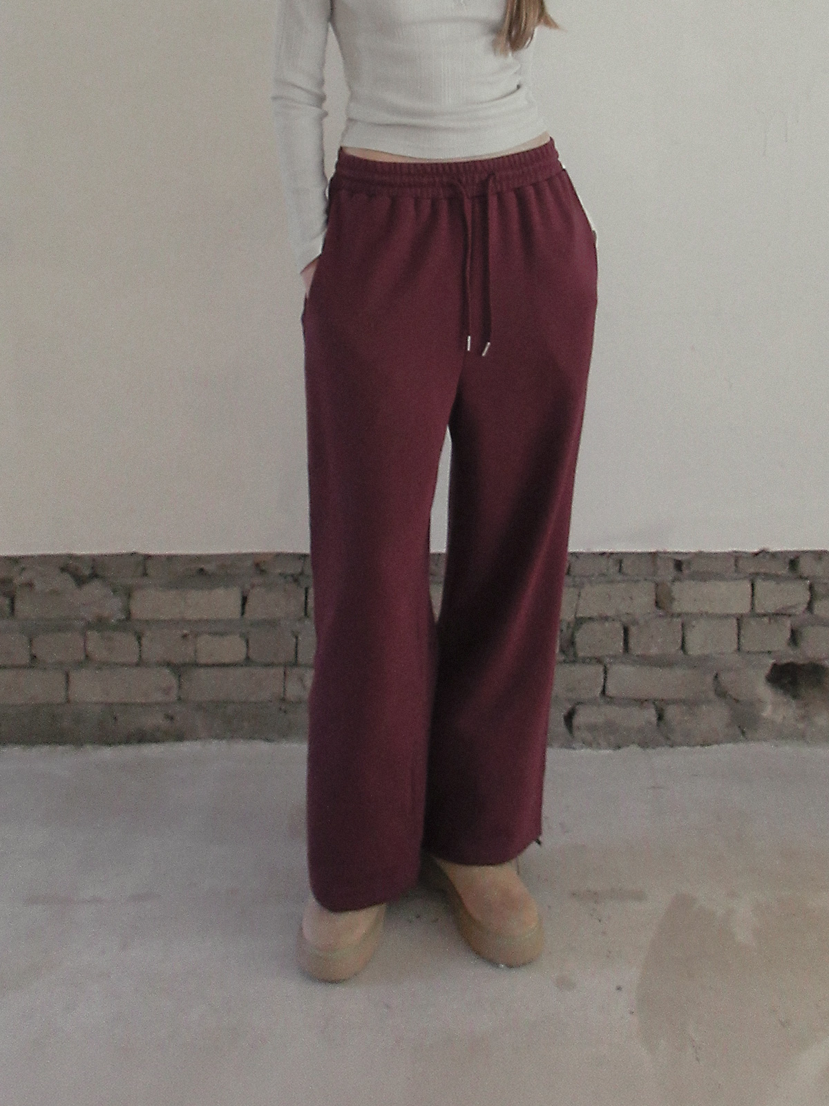 TWEE Reven stud banding long sweatpants - Model styling view