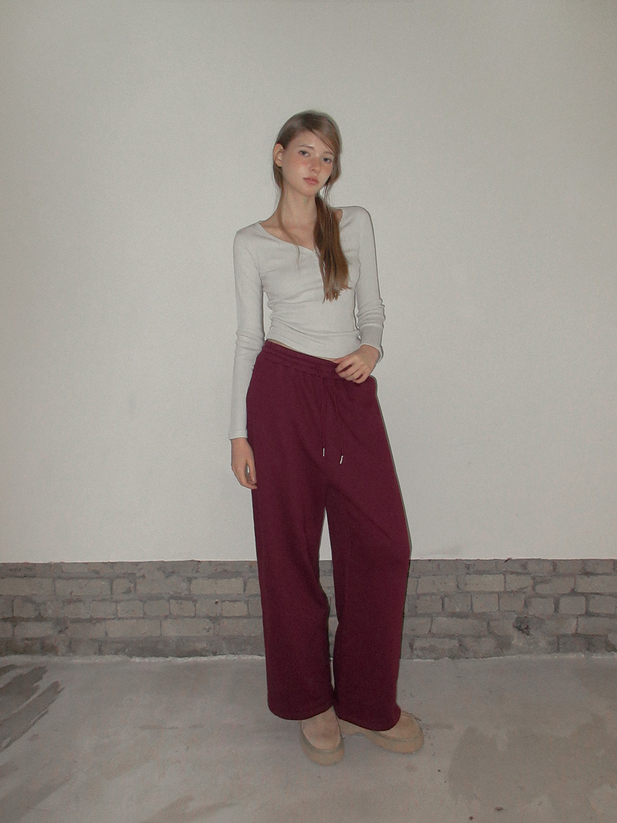 TWEE Reven stud banding long sweatpants - Model styling view