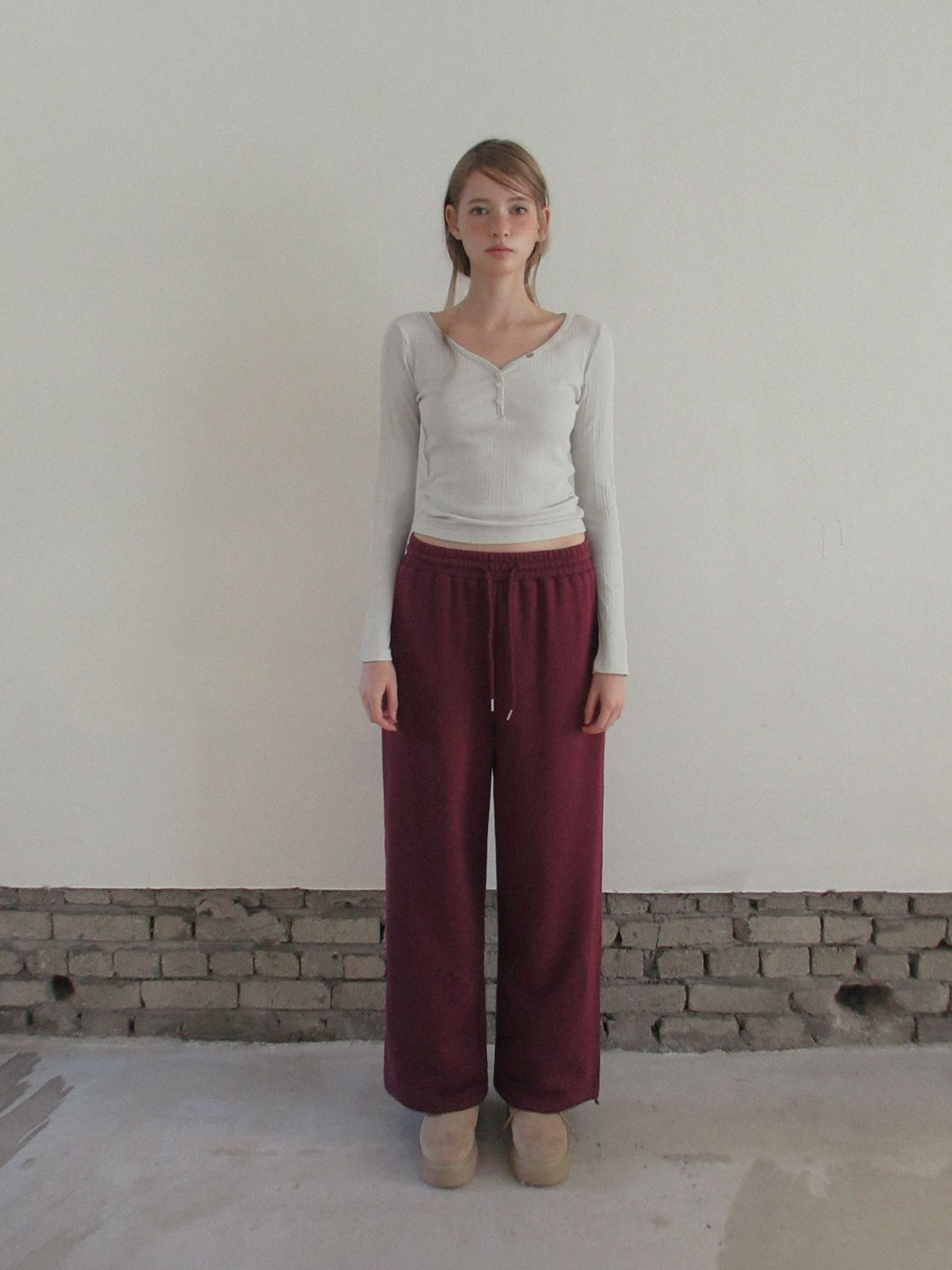 TWEE Reven stud banding long sweatpants - Model styling view