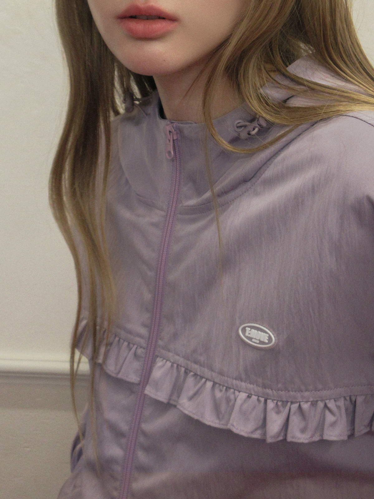 TWEE Bender frill nylon hood windbreaker jumper - Model styling view
