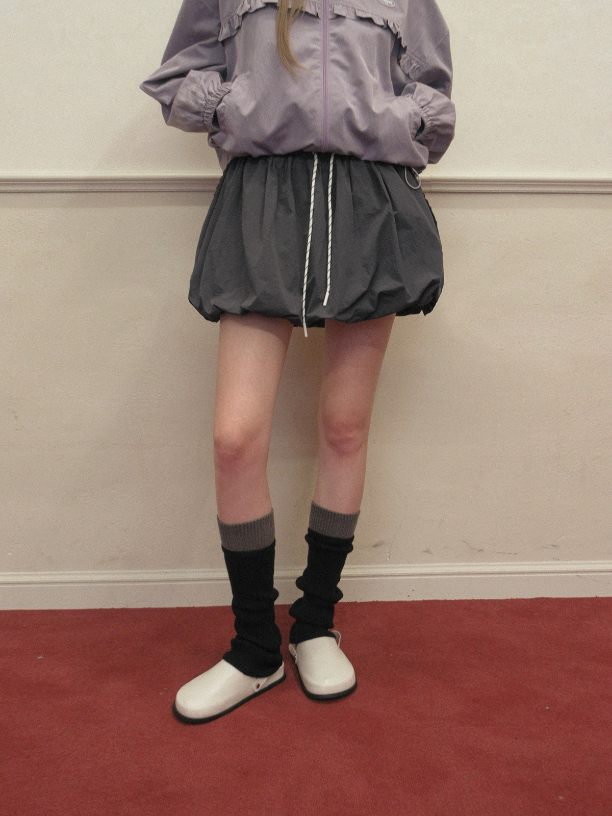 TWEE Colt nylon balloon banding mini skirt - Model styling view