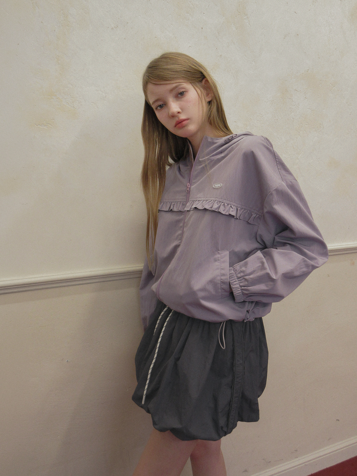 TWEE Colt nylon balloon banding mini skirt - Model styling view