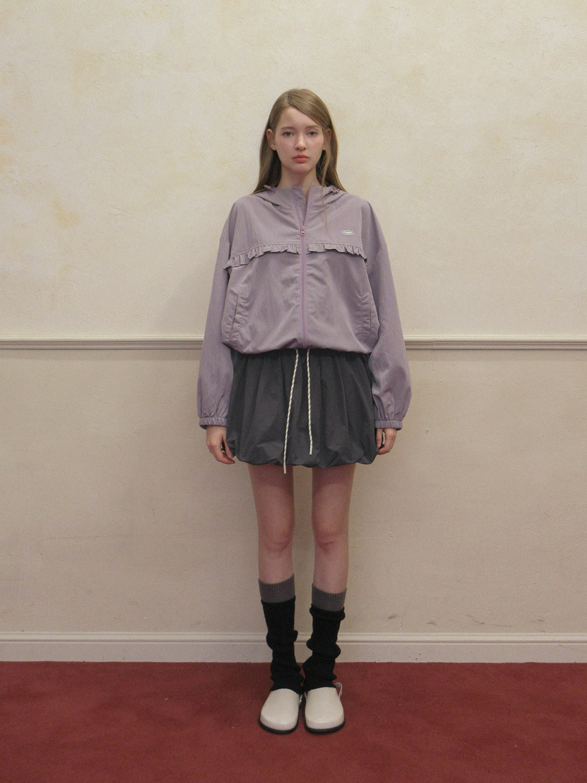 TWEE Colt nylon balloon banding mini skirt - Model styling view